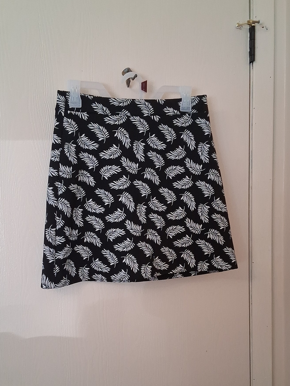 H&M Black Mini Skirt with White Leaf Print